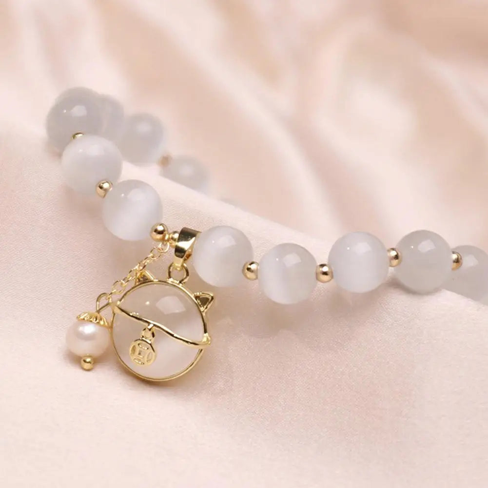 Perlenarmband mit Glückskatzen-Anhänger