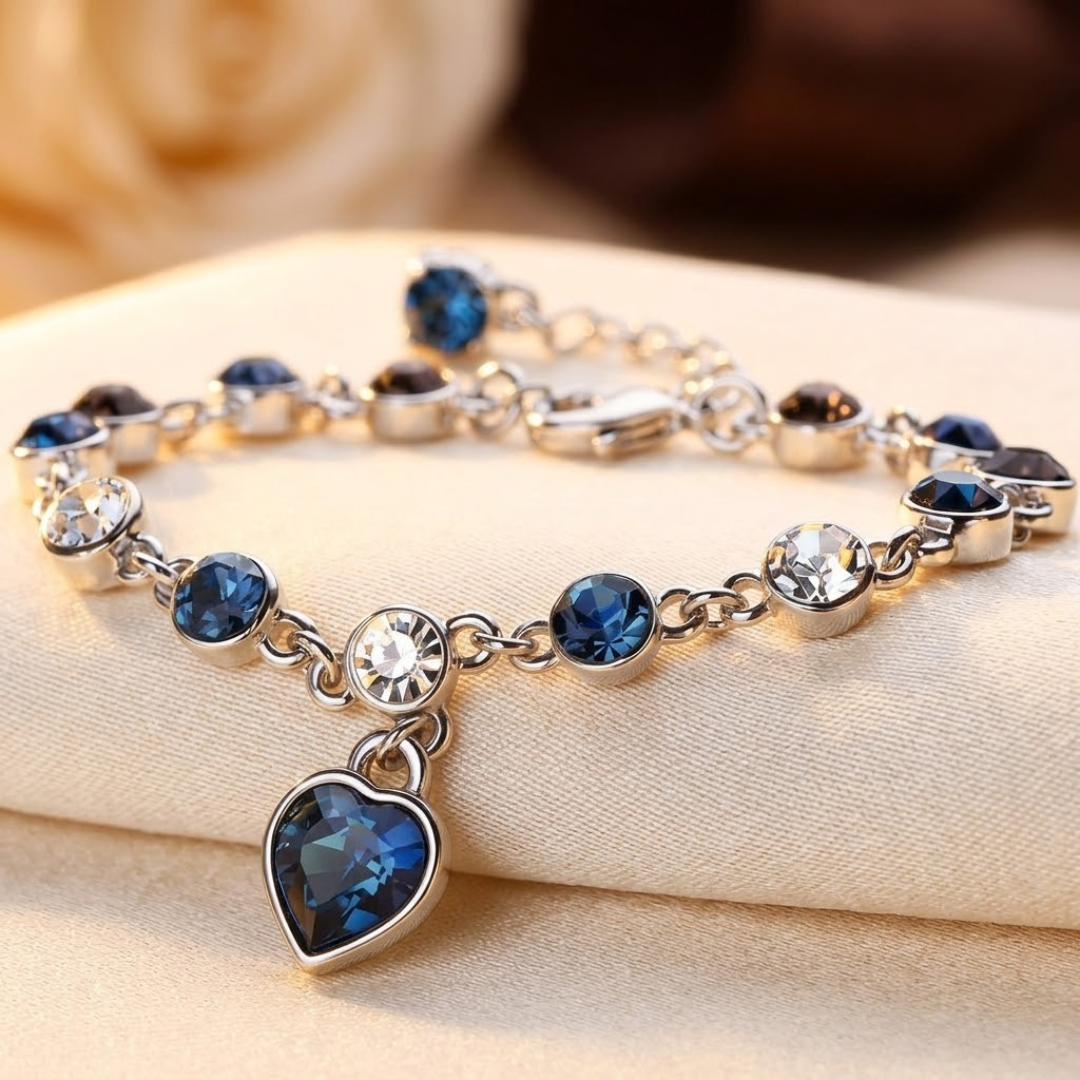Silbernes Herz-Kettenarmband mit Saphir