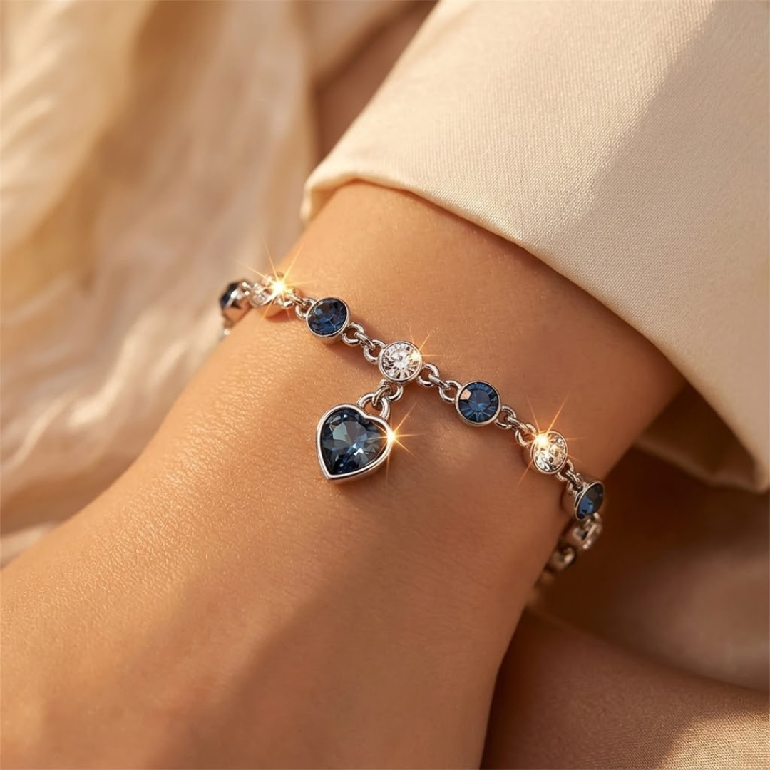 Silbernes Herz-Kettenarmband mit Saphir