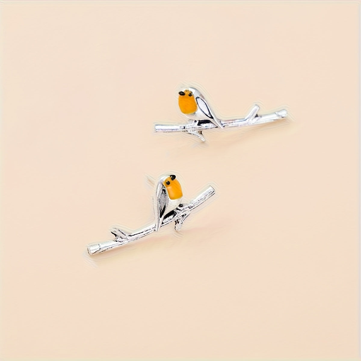 Ohrringe mit Vogelmotiv im Cartoon-Stil