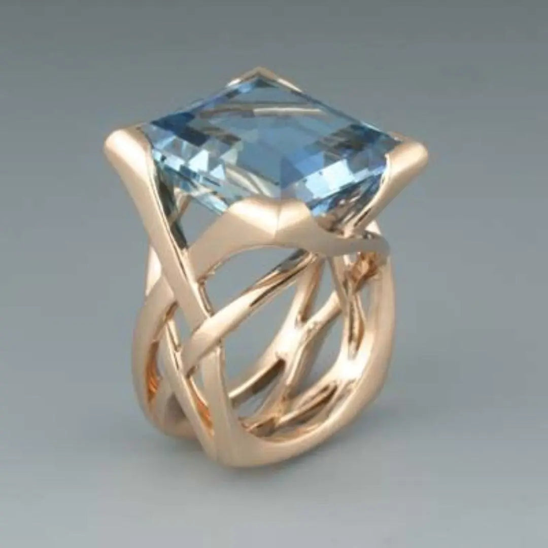Antik inspirierter Roségold-Ring mit blauem Zirkonia