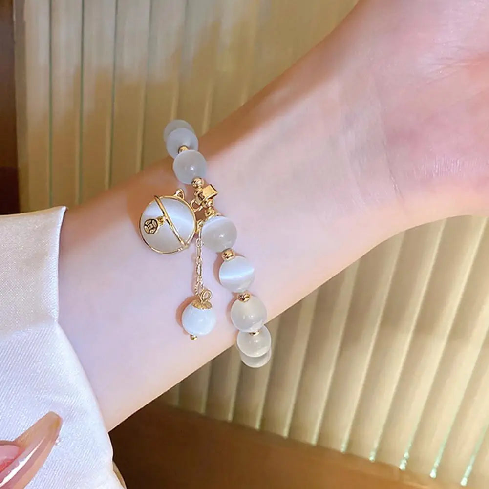 Perlenarmband mit Glückskatzen-Anhänger