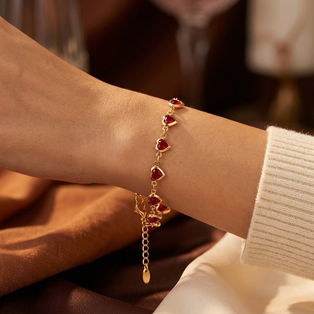 Goldenes Herz-Kettenarmband mit Rubin