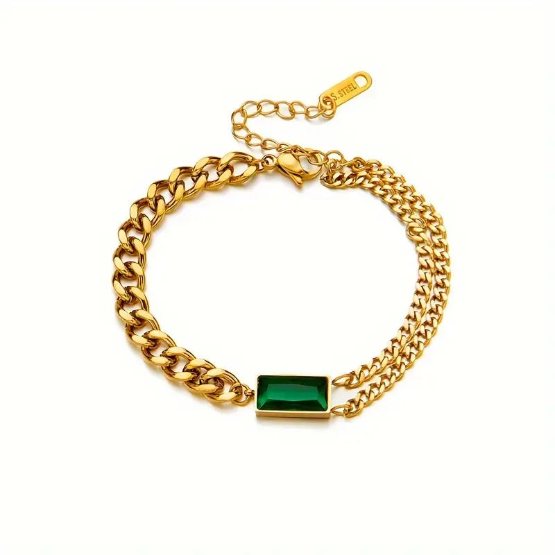 Goldenes Kettenarmband mit Smaragd-Barrelement