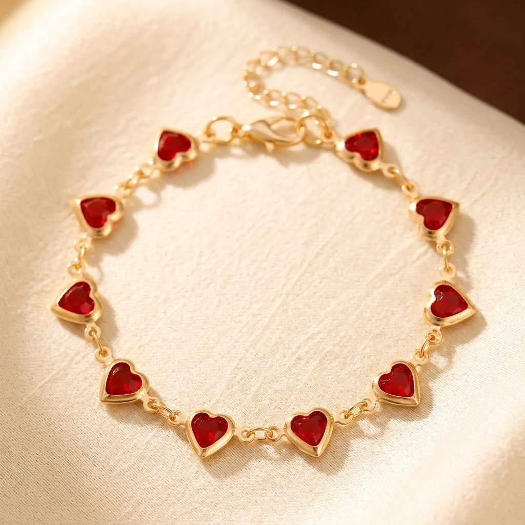 Goldenes Herz-Kettenarmband mit Rubin