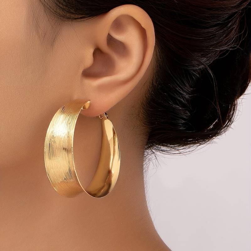 Vintage durchbrochene Creolen in Gold
