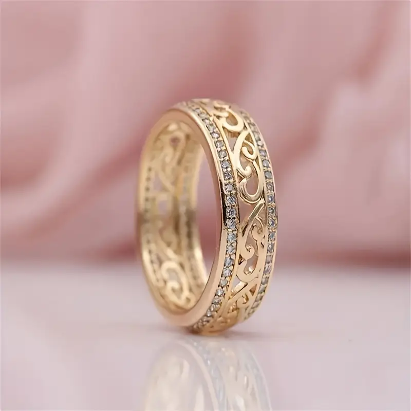 Glänzender, durchbrochener Goldring